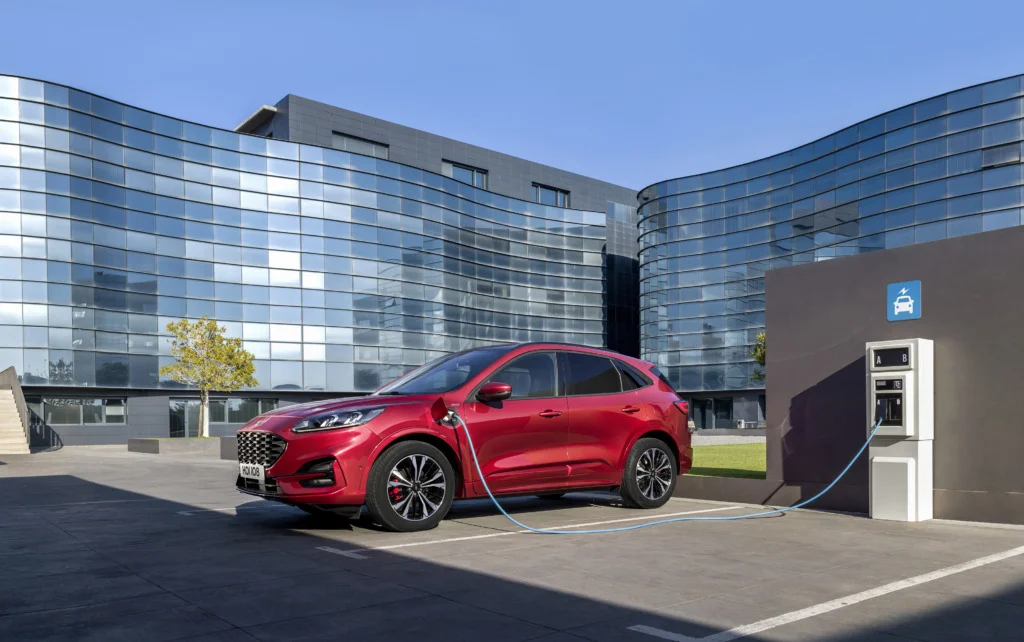 Ford Kuga in red showing side charger