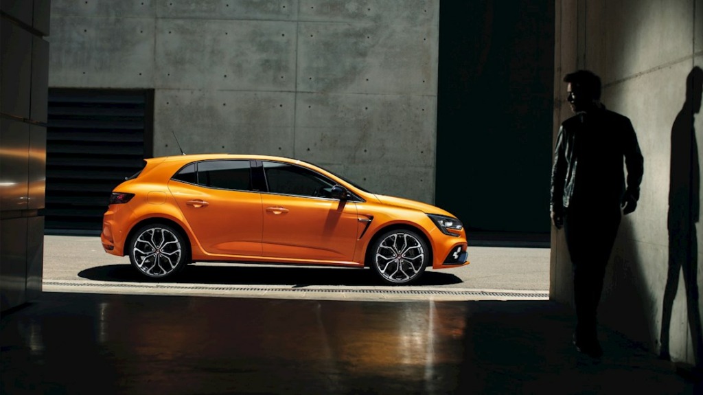 The Renault Megane in orange.